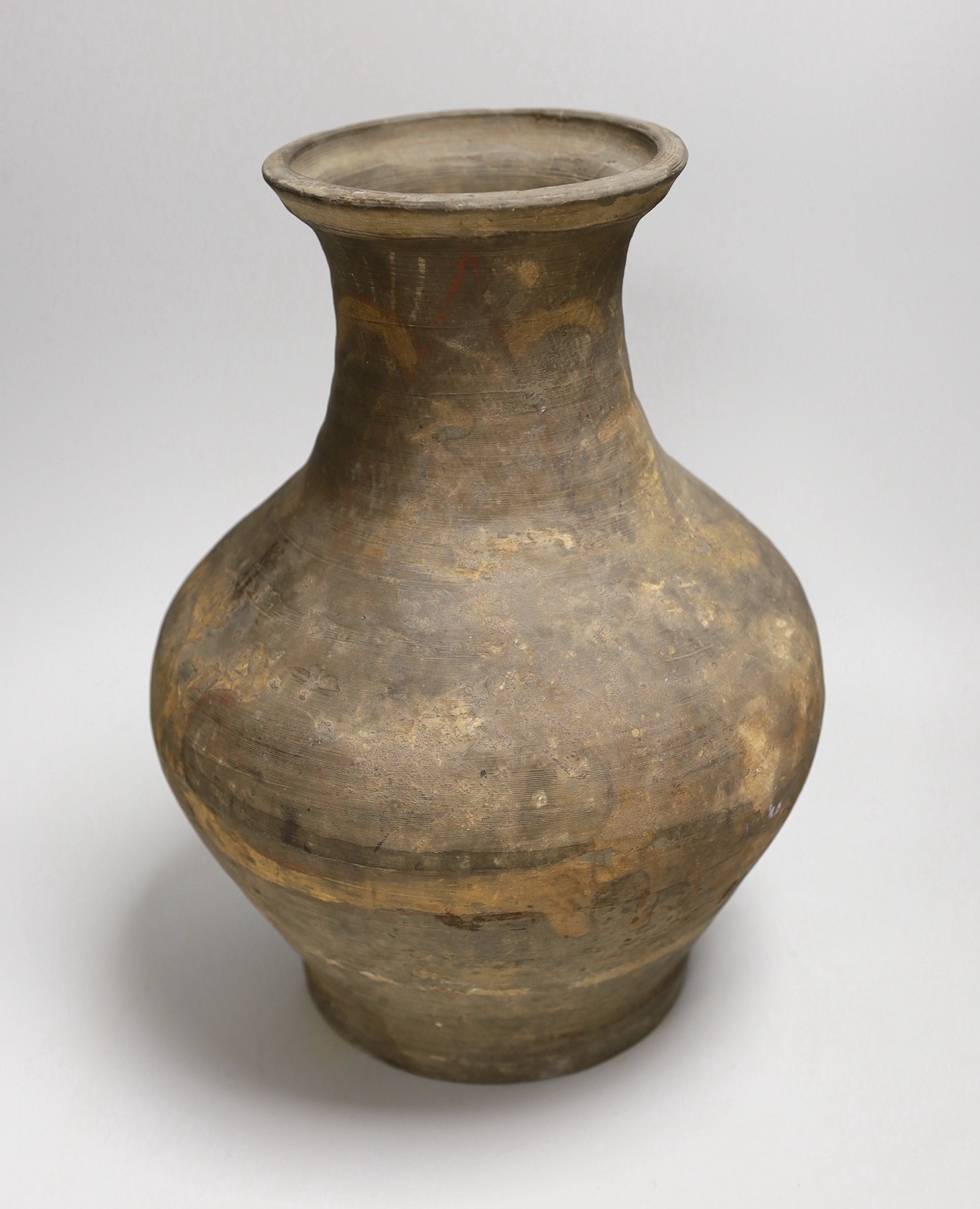 A Chinese pigment painted pottery jar, probably Han dynasty, 32cm